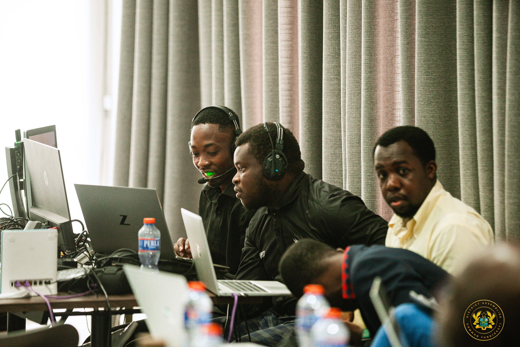Broadcast crew members communicating during an event